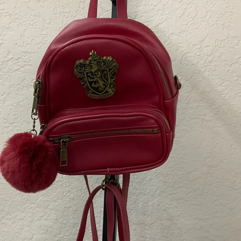 Elegant Red Backpack with Pom Pom Charm